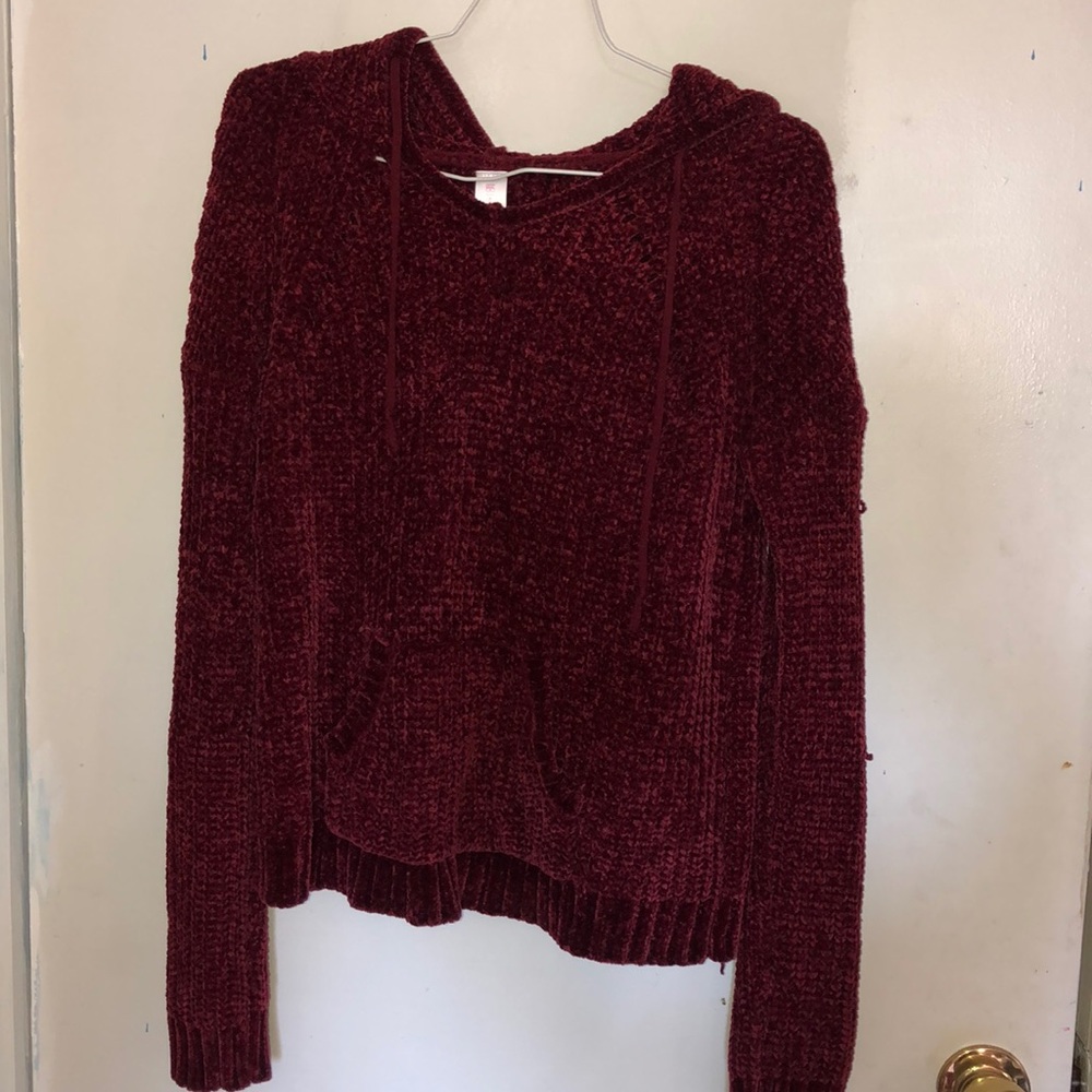 Maroon sweatshirt.